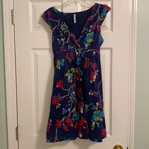 Floral print, cap-sleeve, empire waist dress.